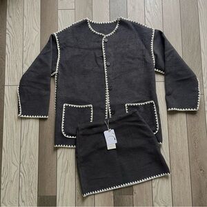 Chic Black and White Trim Cardigan and Skirt Set